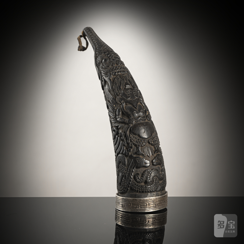 A FINE CARVED HORN MAGICAL POWDER CONTAINER